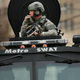 SWAT team patrols a Watertown, Mass., neighborhood during the hunt for Boston bombing suspects. (Spencer Platt/Getty Images)